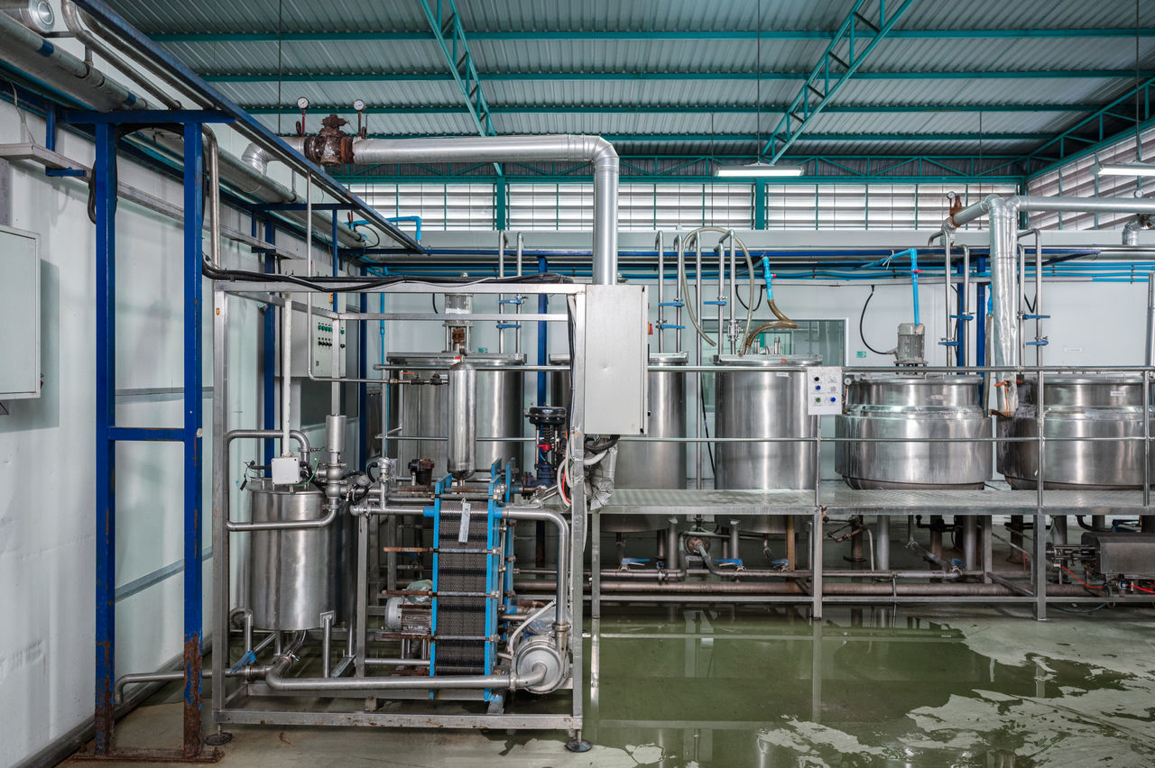 Industrial stainless steel tanks in processing facility