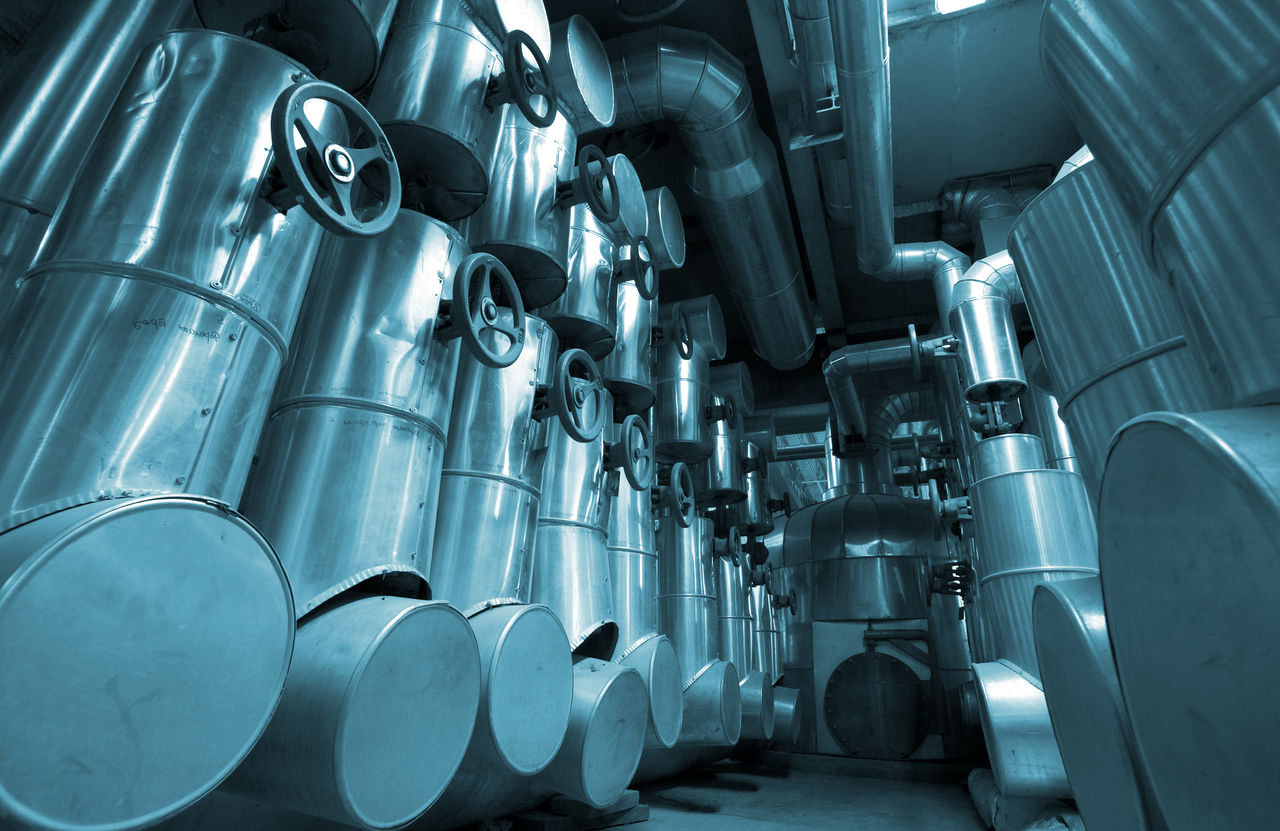 Industrial facility with large metal pipes and valves