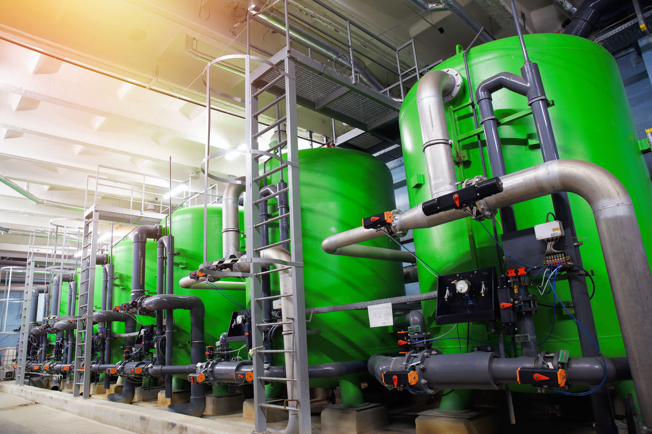 Industrial water filtration tanks in modern facility