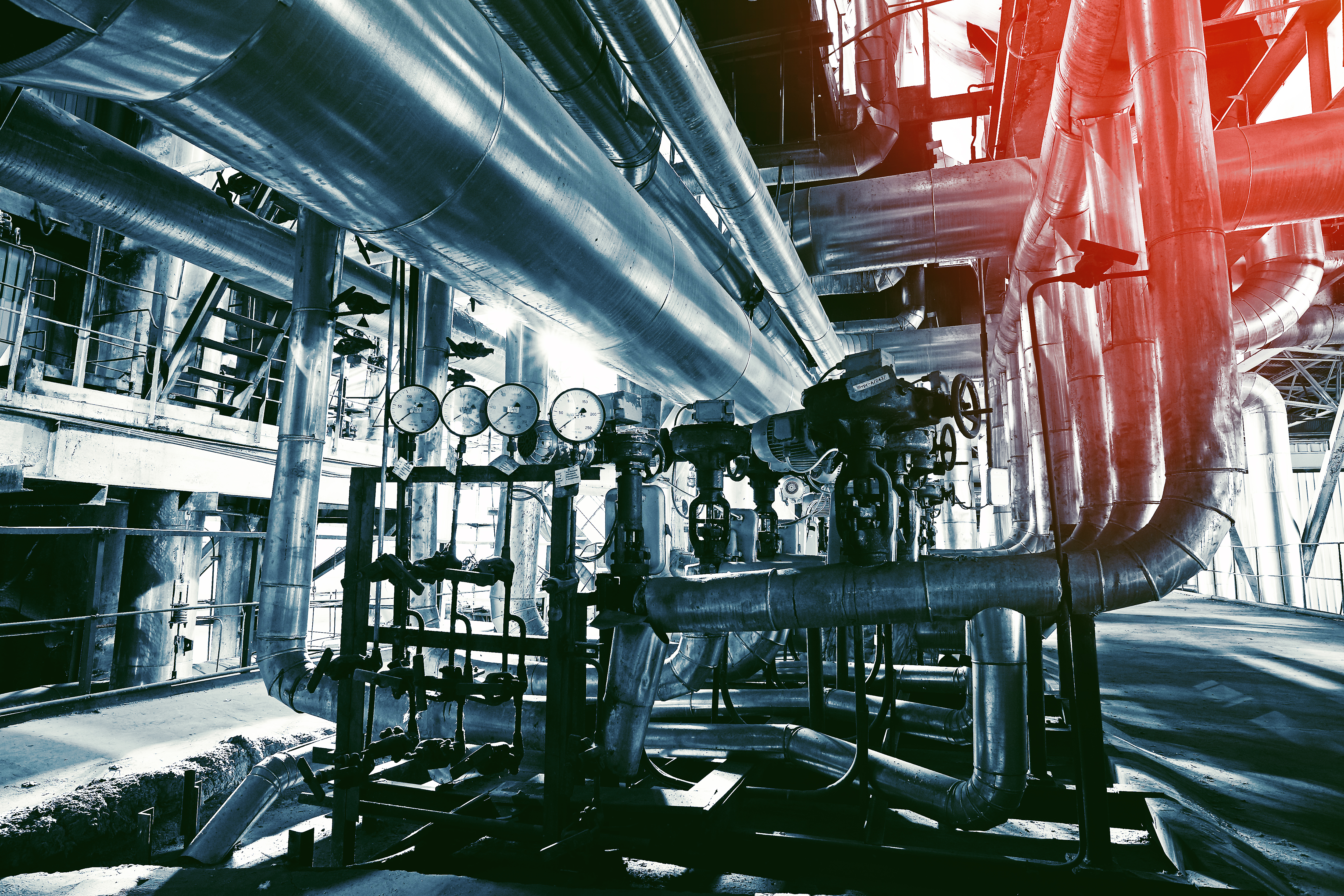 Industrial facility with metal pipes and gauges 
