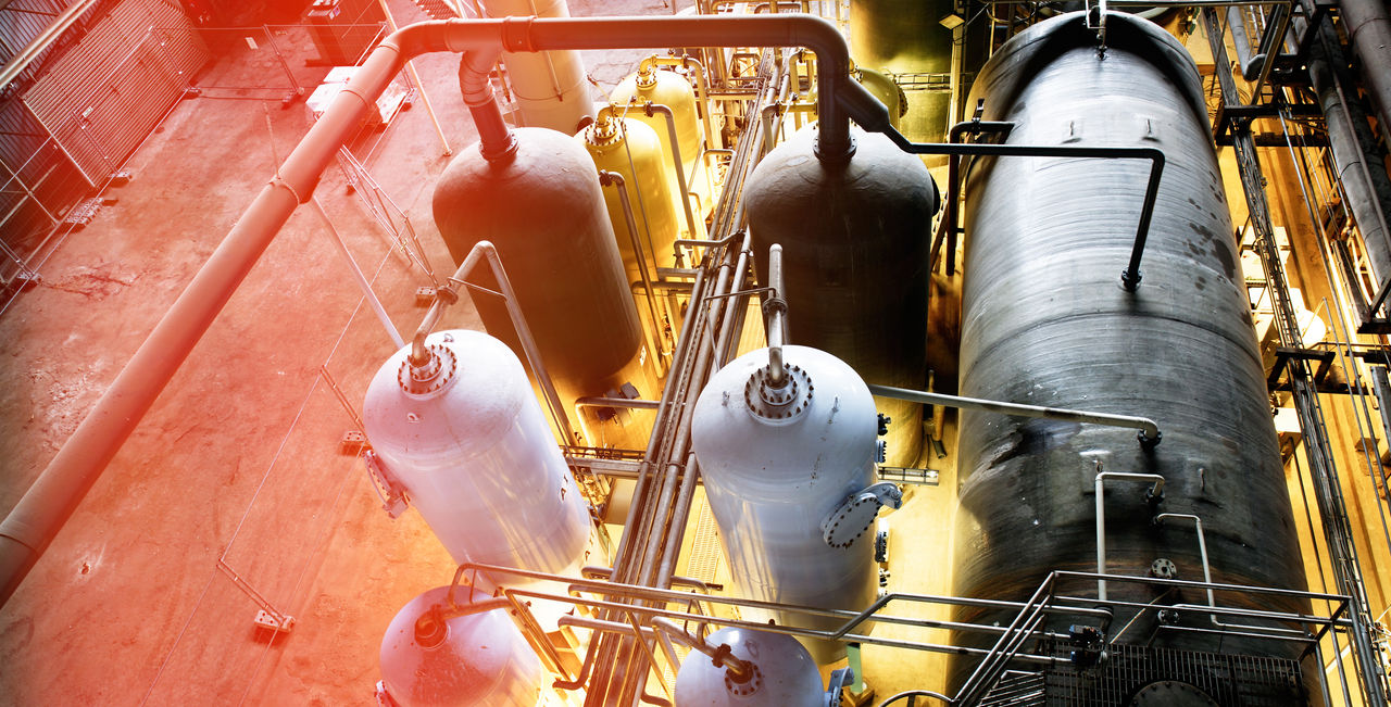 Industrial pressure vessels in modern factory setting